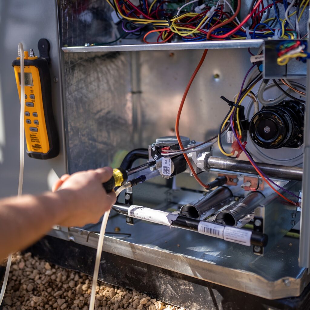 Heat pump unit being repaired